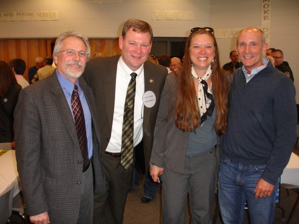 These are the publicly recognized members of the investigation and prosecutorial team that successfully brought murder charges against Ryan Wyngarden. From Left: Doug Mesman, Ottawa County Chief Assistant Prosecutor, Detectives Dave Blakely and Venus Repper, Ottawa Coiunty Sheriff's Department, and Lee Fisher, Senior Prosecuting Attorney. The event was Dave Blakely's retirement celebration